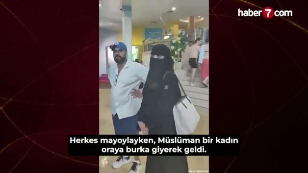 Çarşaflı kadına çirkin saldırı! 'Kıyafetin çocuklarımı korkutuyor'